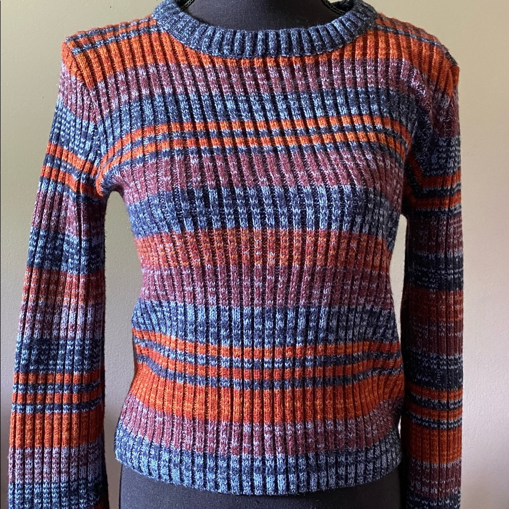 Multi color long sleeve sweater. Size medium